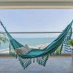 Suite vista al mar con hamaca y 2 camas queen p 12