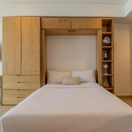 Suite vista al mar con hamaca y 2 camas queen p 12 Apartamento